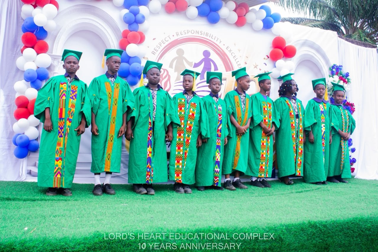 Lord’s Heart pupils in green graduation gowns